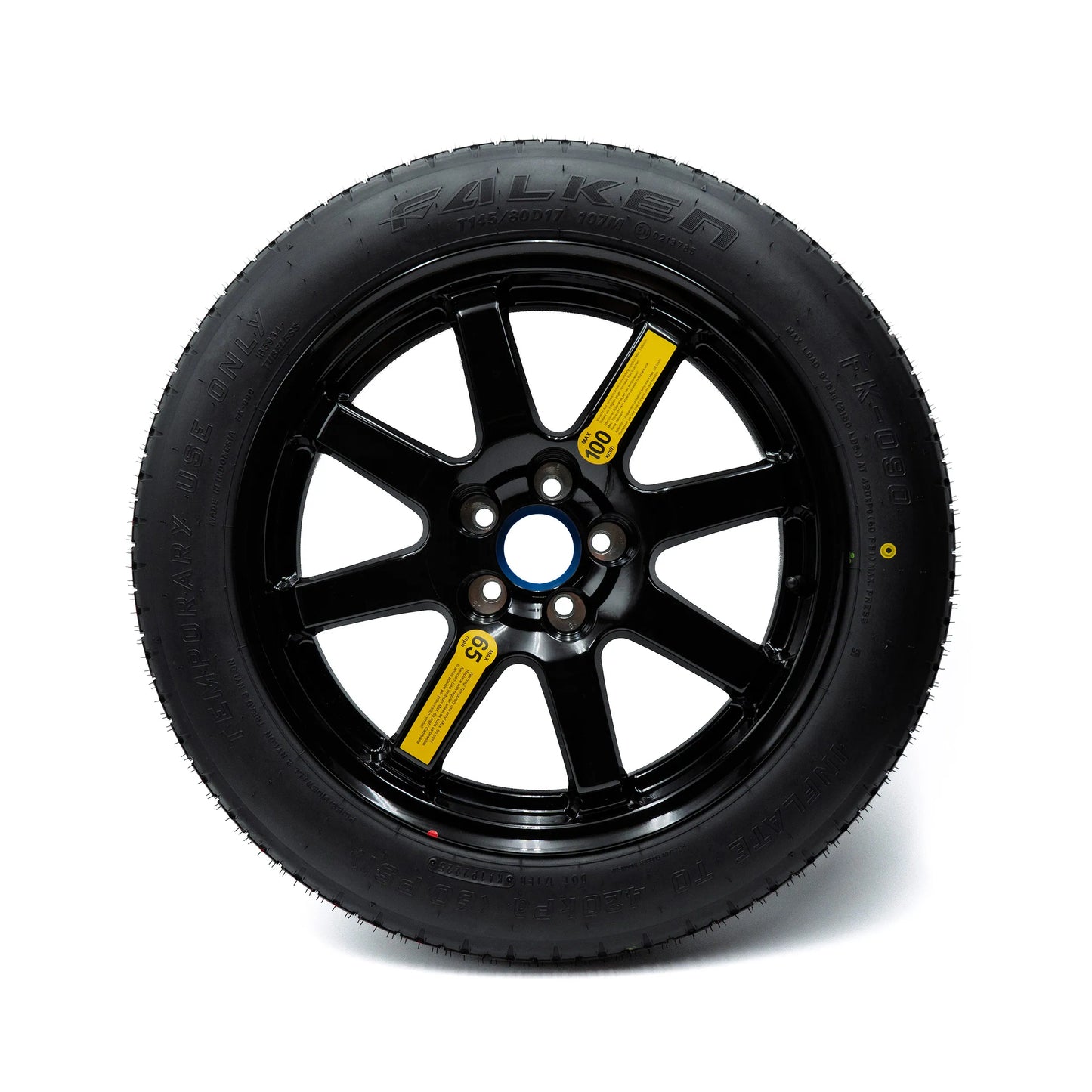 EZ Spare Tire T145/80D17 compact spare with a black alloy wheel and a temporary use warning label.