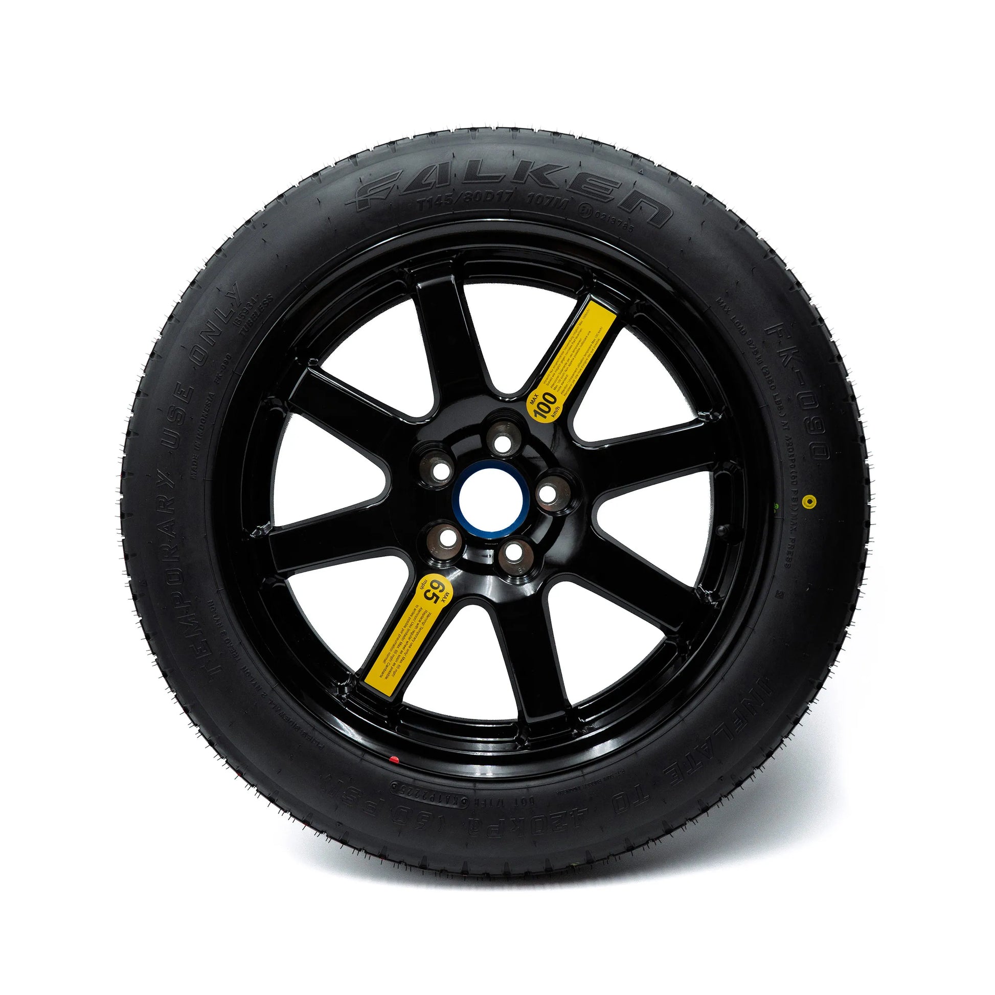 EZ Spare Tire T145/80D17 compact spare with a black alloy wheel and a temporary use warning label.