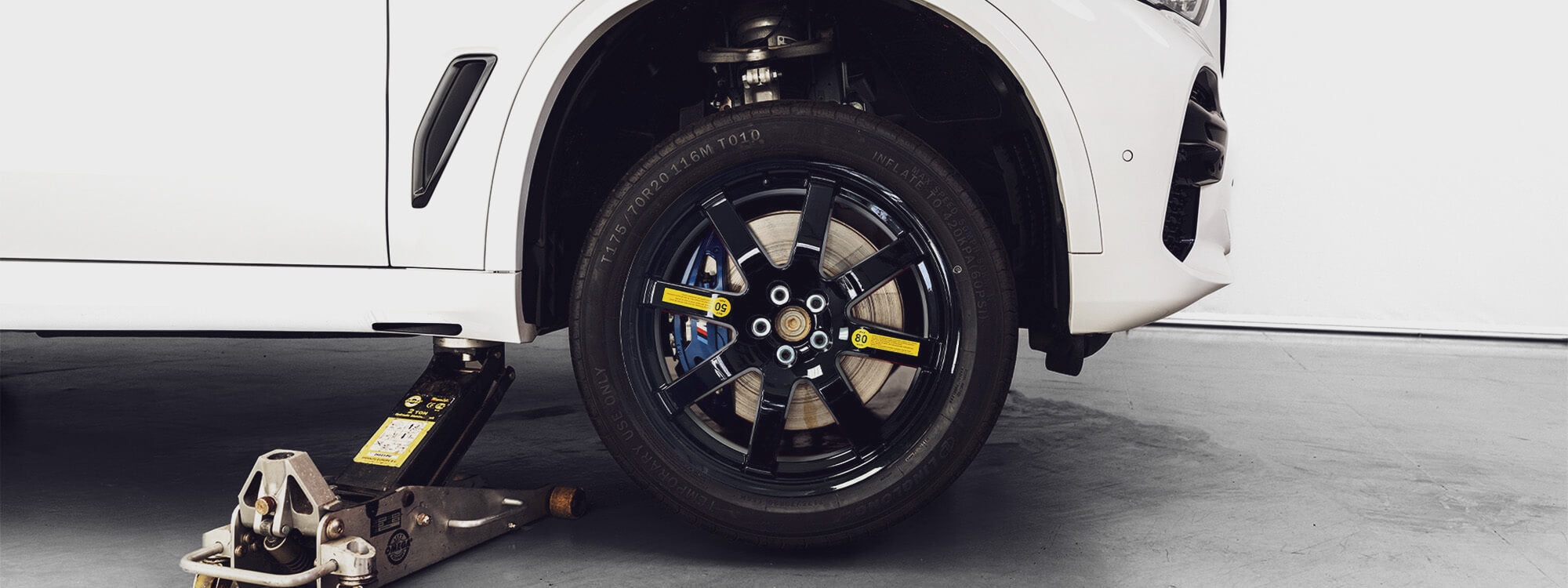 EZ Spare Wheel compact spare tire installed on a BMW x5