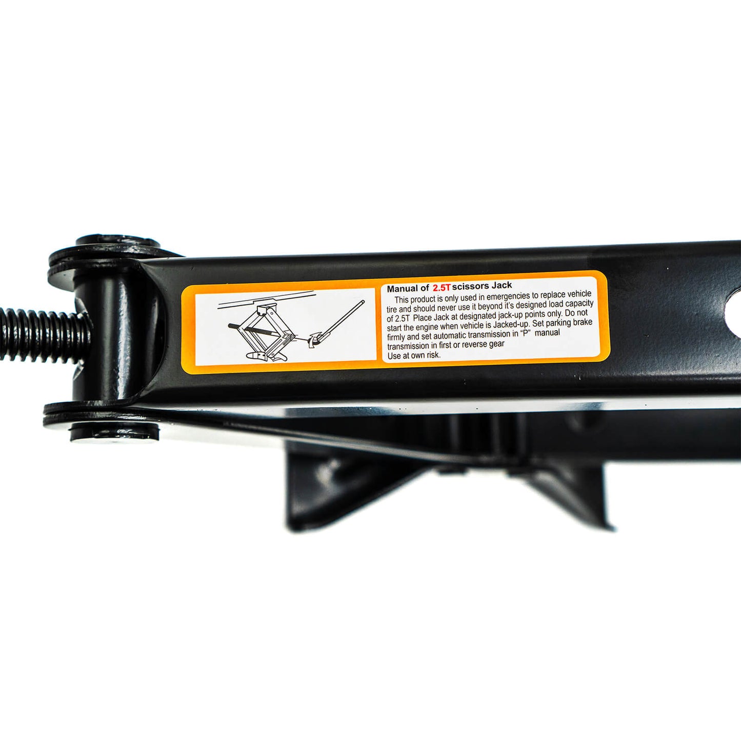 Close-up view of the manual instructions label on a 2.5-ton black scissor jack, outlining proper usage guidelines and safety precautions with an illustrative diagram.