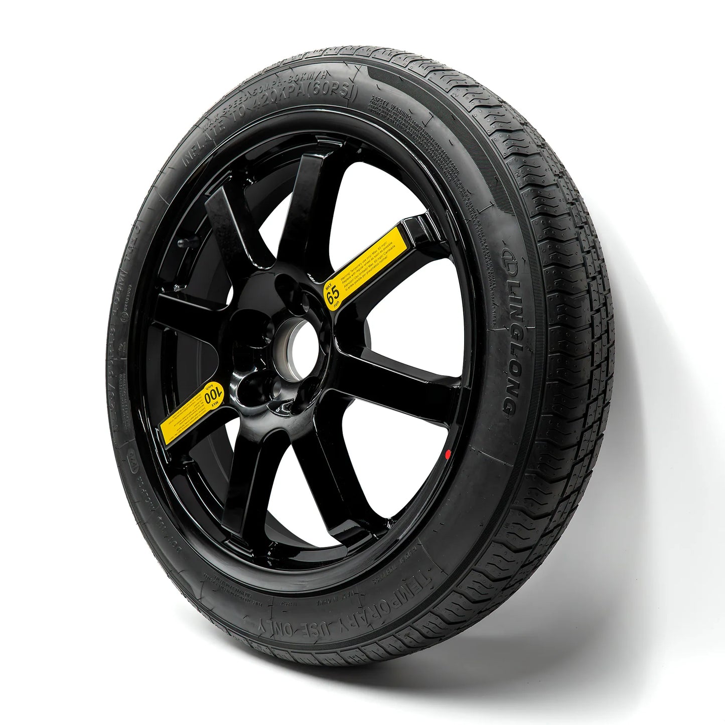 A compact spare tire with tire size 135/90r17 with black alloy wheel