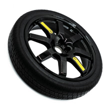 Top view of EZ Spare Wheel and Tire showing 65 mph temporary use label for emergency spare compatibility across most vehicles