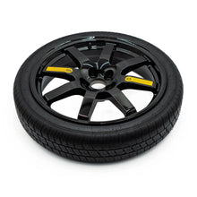 Top view of EZ Spare Wheel and Tire showing 65 mph temporary use label for emergency spare compatibility across most vehicles