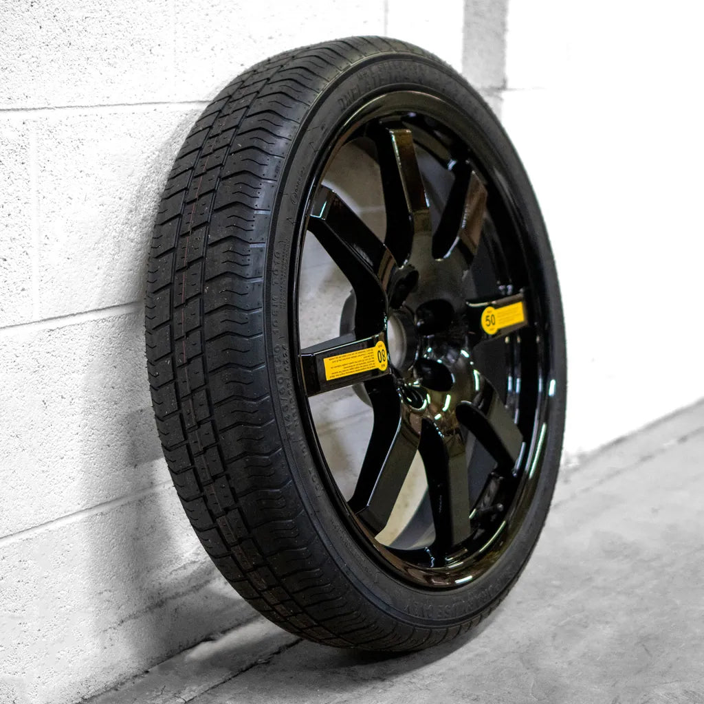 A side view of the EZ Spare Wheel and tire with the black option; a reliable solution for vehicle owners who need a spare tire. Never get stranded with our dependable and easy-to-install spare tires.