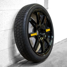 A side view of the EZ Spare Wheel and tire with the black option; a reliable solution for vehicle owners who need a spare tire. Never get stranded with our dependable and easy-to-install spare tires.