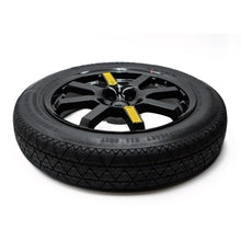 Detailed close-up side view of the spare wheel tire designed for the Jeep Compass, highlighting its construction and quality.